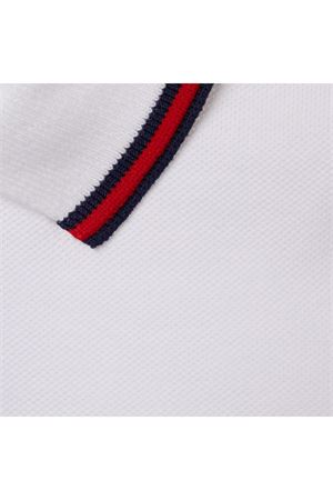 Polo in piquet di cotone elasticizzato bianco GUCCI KIDS | 805415XJGXV9250